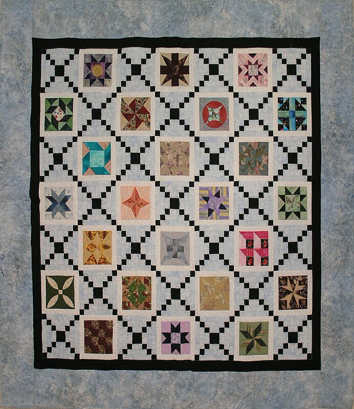 A quilt made using Penny Herrins pieced applique method